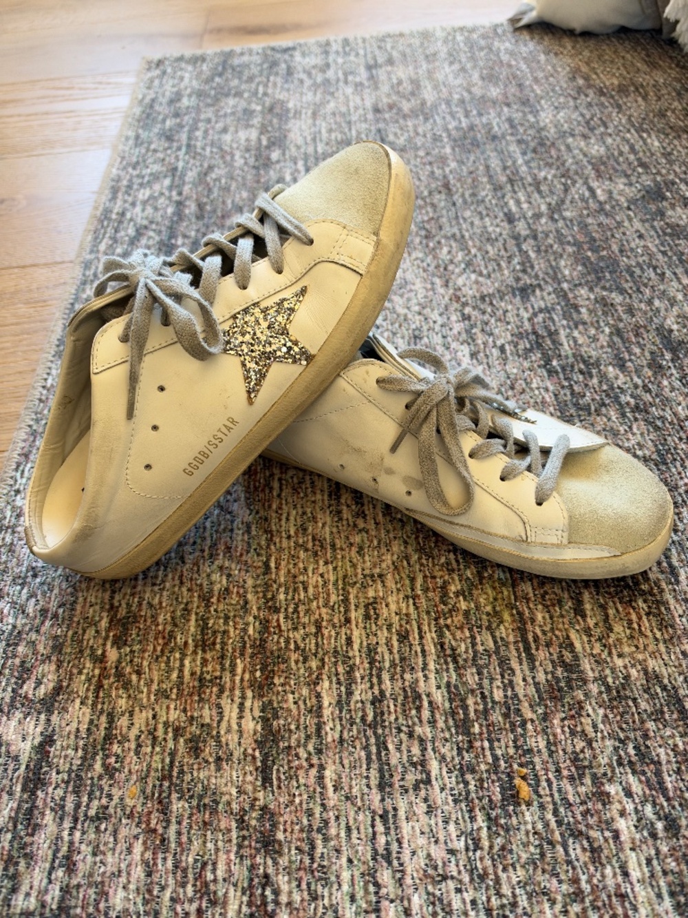 Golden Goose Super-Star Sabot with a platinum glitter star and suede tongue